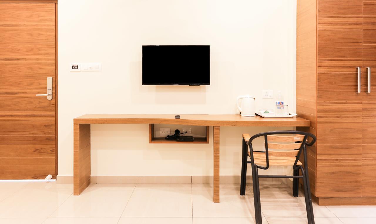 Treebo Trend Cmks Gulmohar Suites Kochi Exteriér fotografie